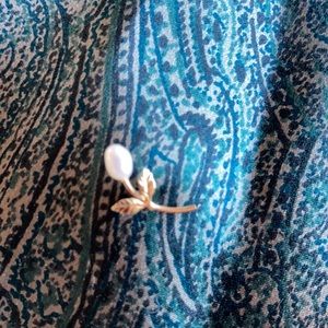 Pearl rosebud pin.